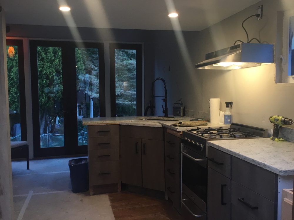 Tiny House kitchen and living space built with as many reused and repurposed building materials as possible.